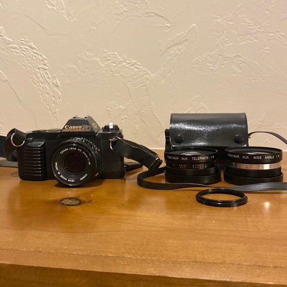 Canon T50 lens adapter 2 extra lenses with lenses case.
